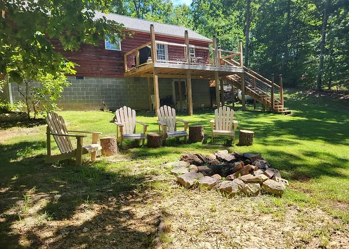 Gas Fireplace, Firepit, And Cedar Adirondack Chair