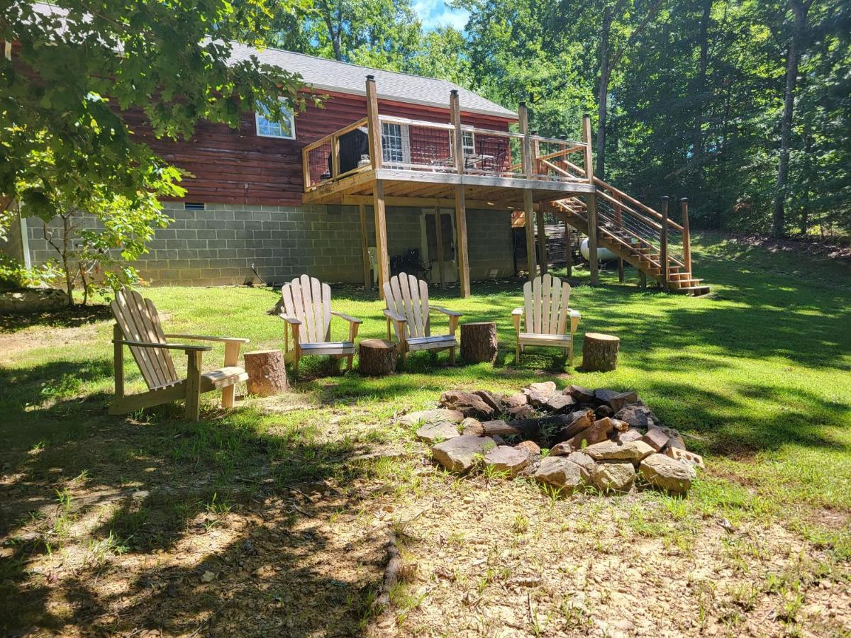 Gas Fireplace, Firepit, And Cedar Adirondack Chair